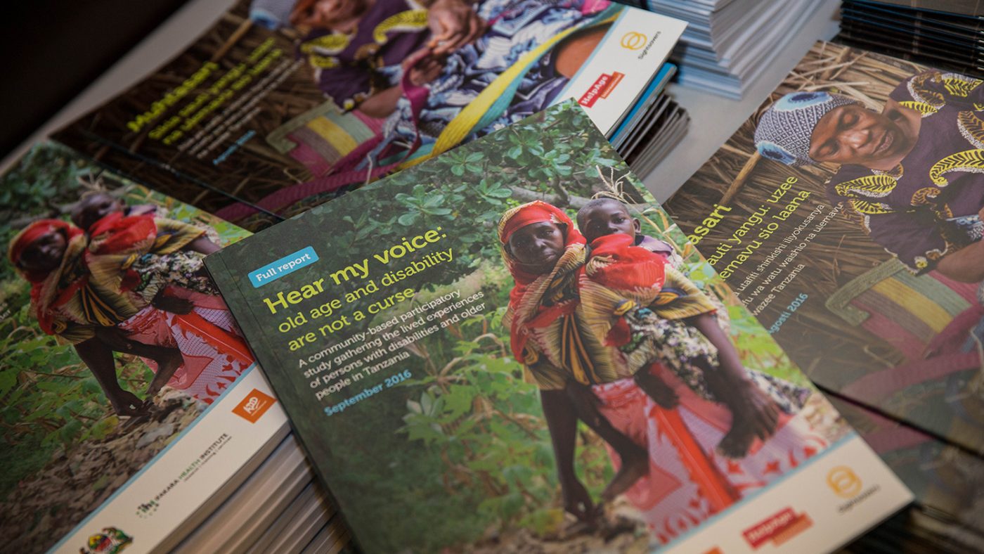 A photo of the cover of the report and the summary “Hear my voice: old age and disability are not a curse”.