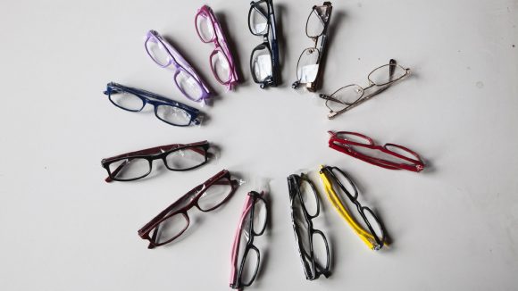 A selection of brightly coloured glasses for children.