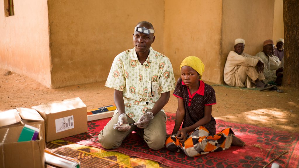 Rukkaya is about to receive treatment for trachoma.