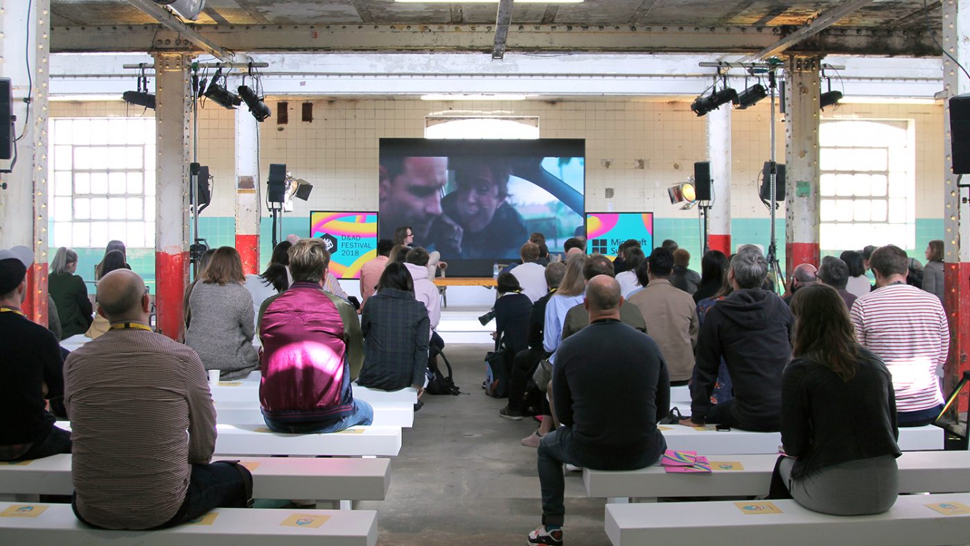 Speakers on stage at the D&AD exhibition.