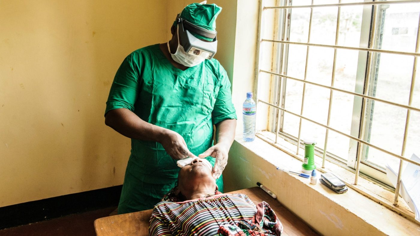 Dr Lukanga operating on Aluna at the surgical camp