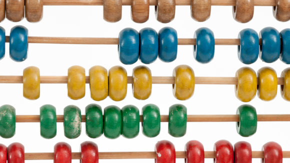A close-up of a colourful abacus.