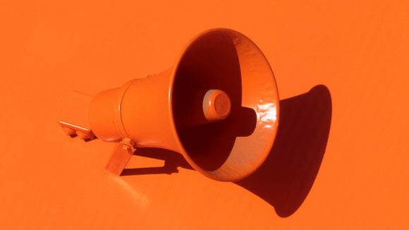 A bright orange megaphone.