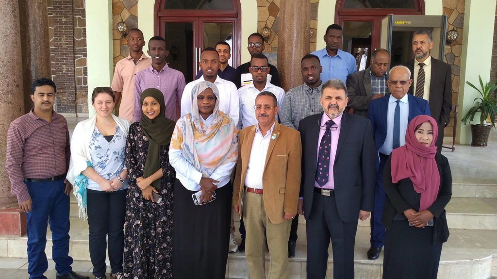 Group of Tropical Data training participants and trainers stand for a portrait together in Sudan.