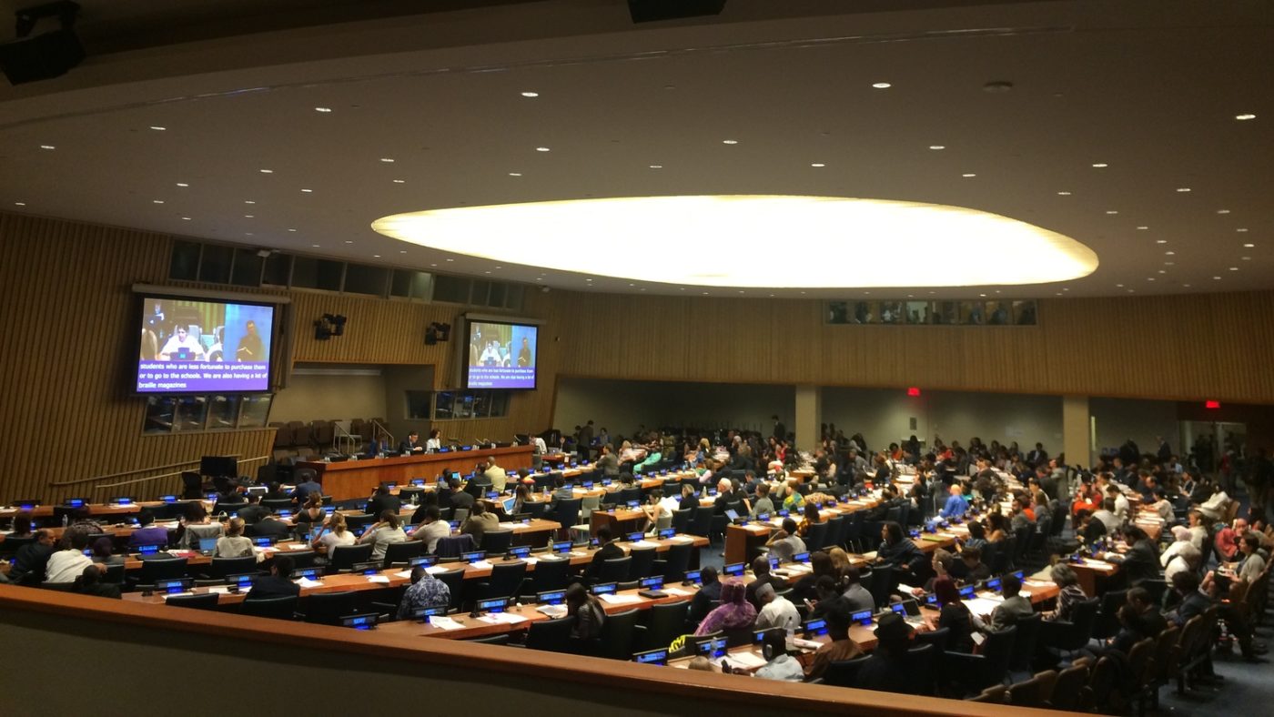 A busy conference chamber at the United Nations.