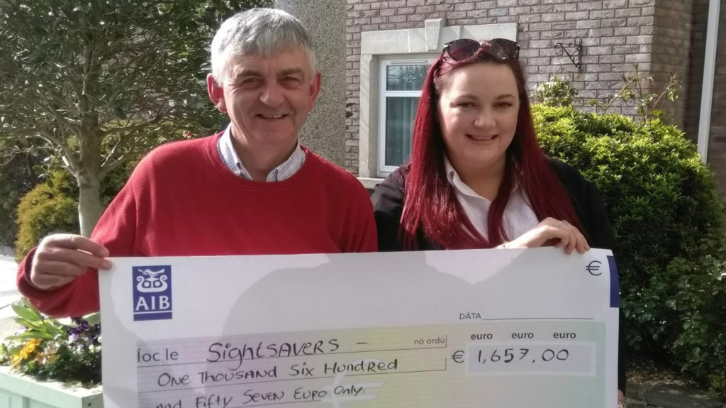 Aideen and Oliver in Ireland with fundraising cheque for €1,657.