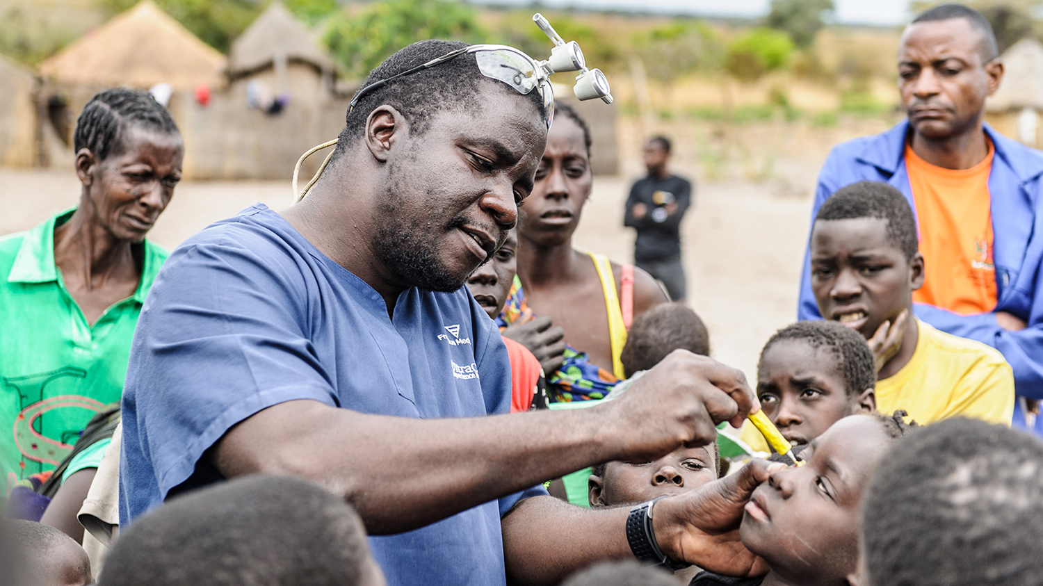 Dr Ndalela examines a child's eyes for signs of trachoma.