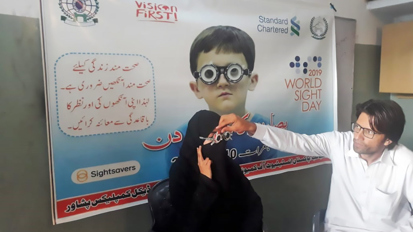 A women has her eyes tested.