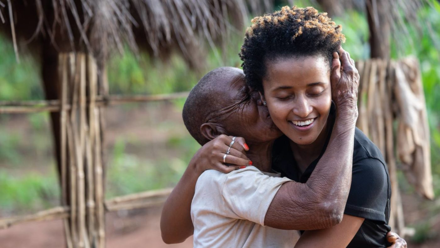 Trachoma patient Maria Fonte gives Mercia a hug after the bandages are removed from her eyes following sight-saving surgery.
