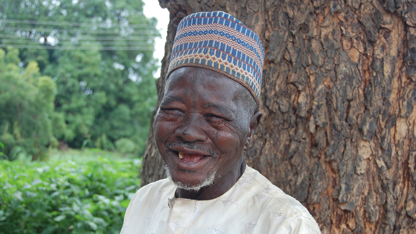Usman smiles after receiving eye surgery.