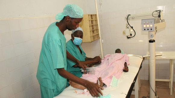 Person in surgery for an eye operation.