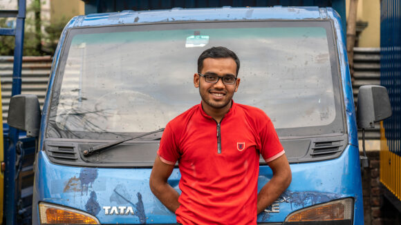 A man standing in front of a van.