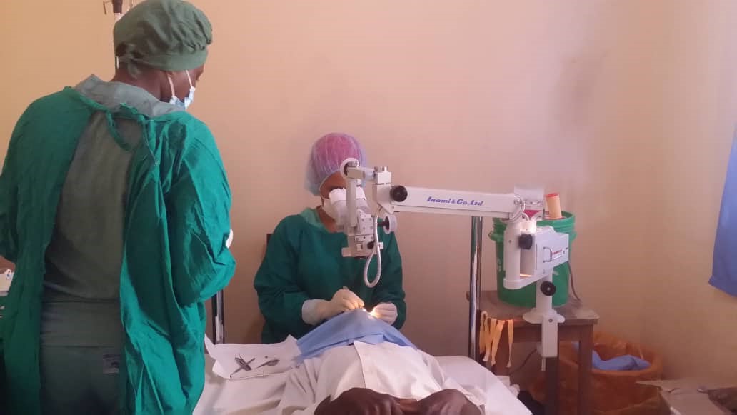 Two surgeons operating.