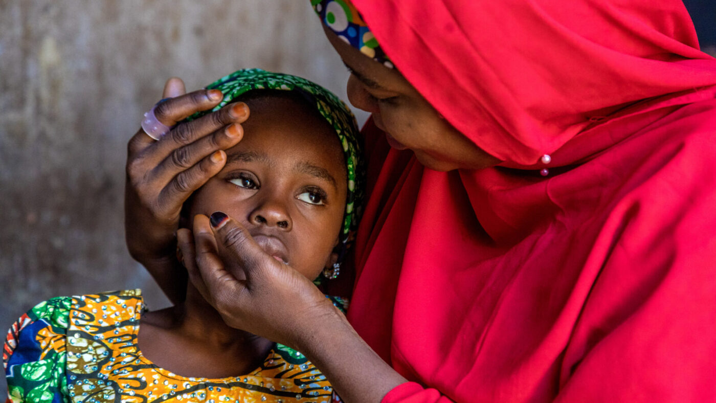 Khadijah being embraced by her mother.