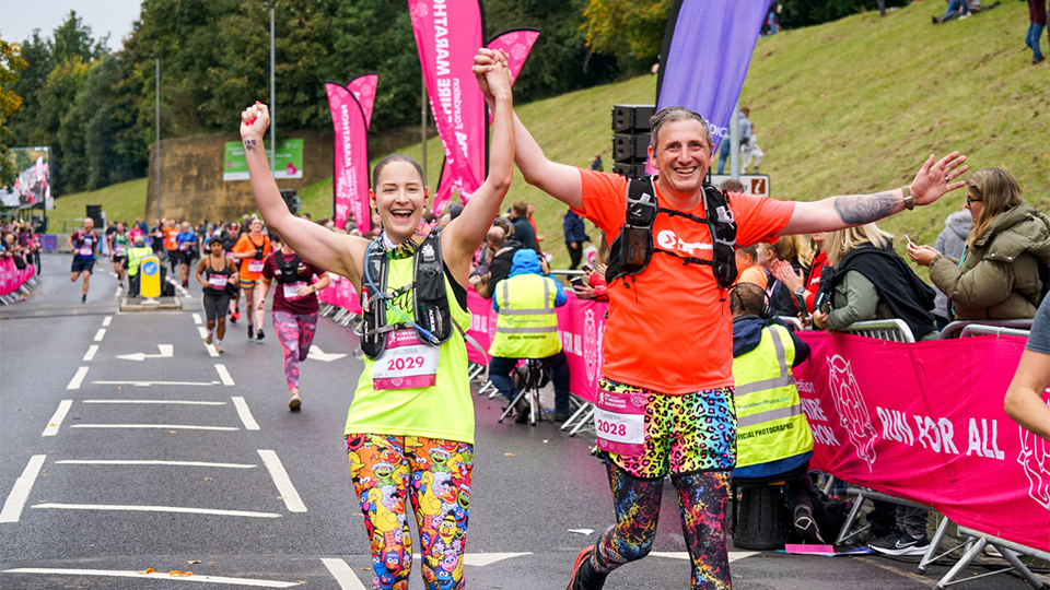 Two Yorkshire Marathon runners celebrate.