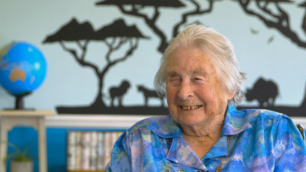 Sightsavers co-founder Lady Jean Wilson smiles during an interview marking her 100th birthday.